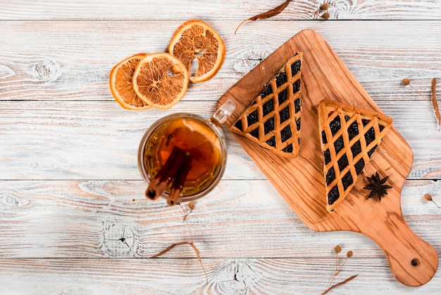 Flat lay of tea with pie slices