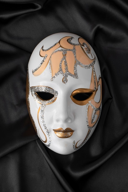 Free photo flat lay theater mask still life