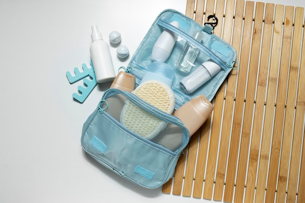 Free photo flat lay toilet bag with products arrangement