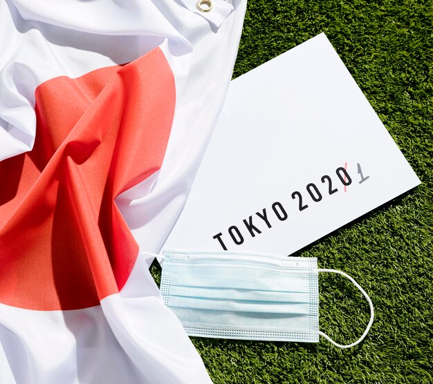 Flat lay tokyo 2020 sports event postponed composition