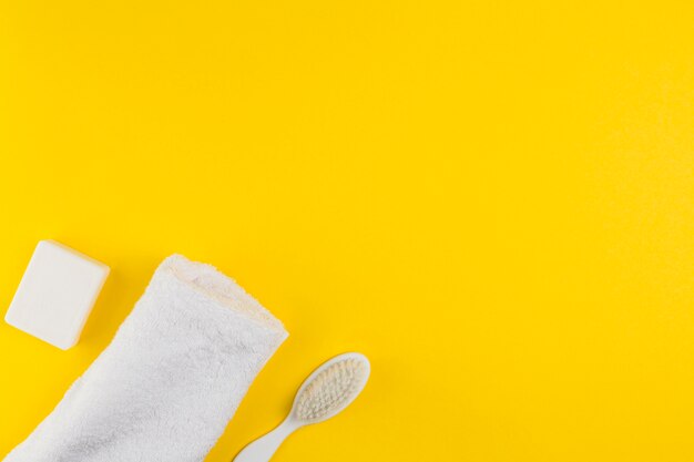 Flat lay of towel and brush for baby shower