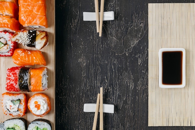 Flat lay traditional japanese sushi with copy space