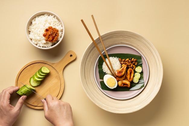 Flat lay traditional nasi lemak meal assortment