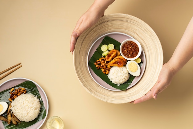 Free photo flat lay traditional nasi lemak meal composition