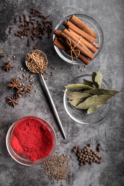 Flat lay transparent bowls with spices