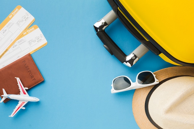 Free Photo | Flat lay of travel essentials and luggage