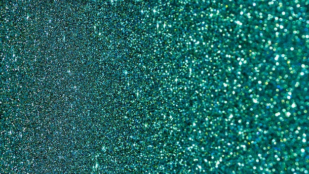 Flat lay turquoise glitter background