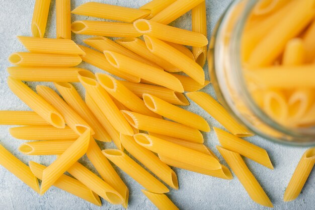 Flat lay uncooked penne