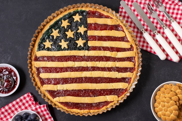 Flat lay usa flag pie with cutlery