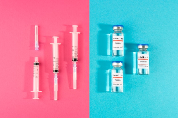 Flat lay vaccine vials and syringes