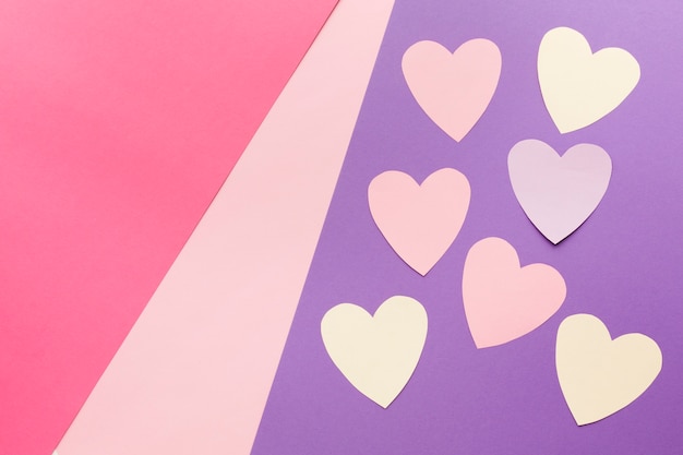 Free photo flat lay of valentines day paper hearts