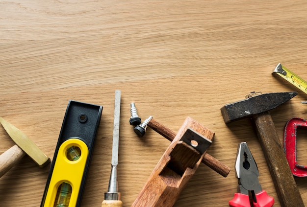 Flat lay of various technician tools isolated