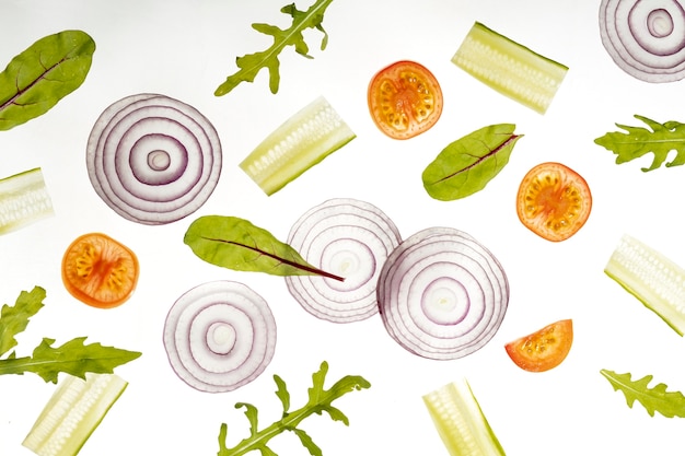 Free photo flat lay vegetable slices arrangement