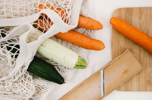 Flat lay vegetables in crochet net bag