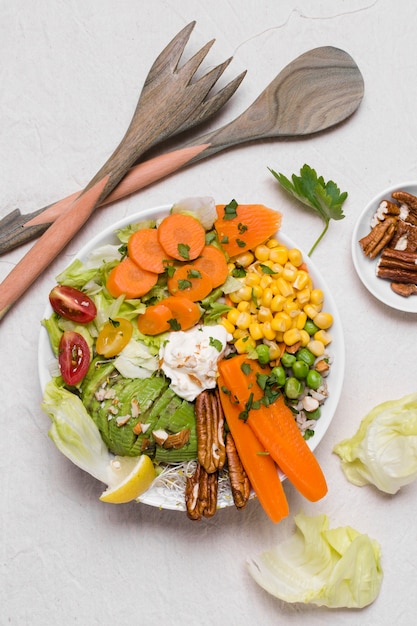 Flat lay of vegetables and walnuts