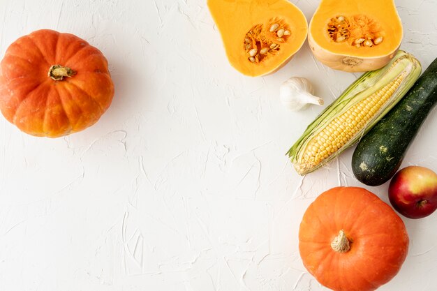 Flat lay vegetables on white background with copy space