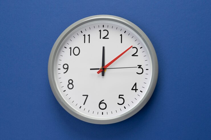 Free Photo flat lay wall clock still life