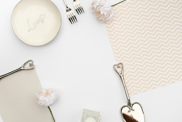 Flat lay wedding table design with cutlery