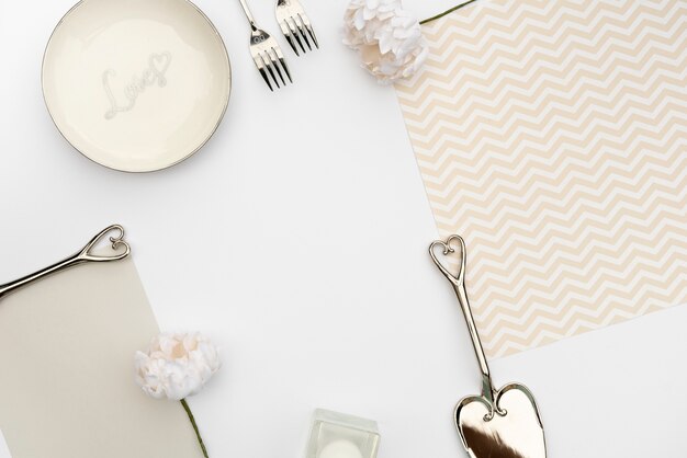 Flat lay wedding table design with cutlery