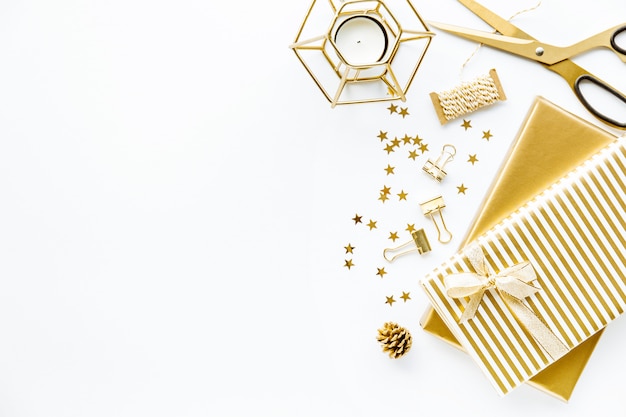 Flat Lay on White Background with Golden Deco