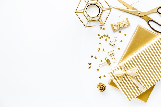 Flat Lay on White Background with Golden Deco