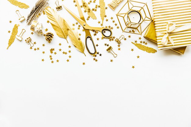 Flat Lay on White Background with Golden Deco