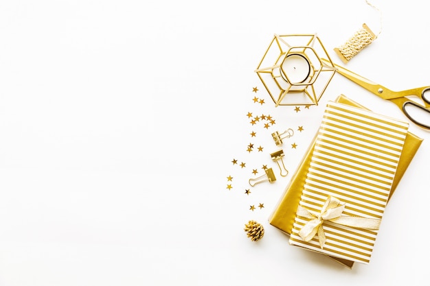 Flat lay on white background with golden deco