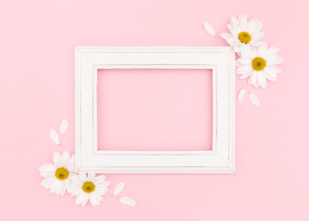 Flat lay of white frame with copy space
