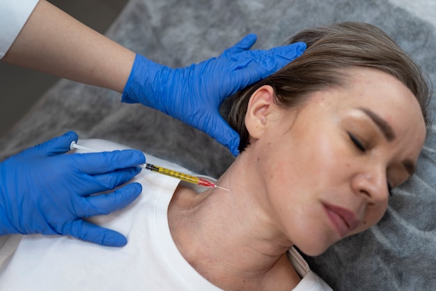 flat lay woman getting prp injection