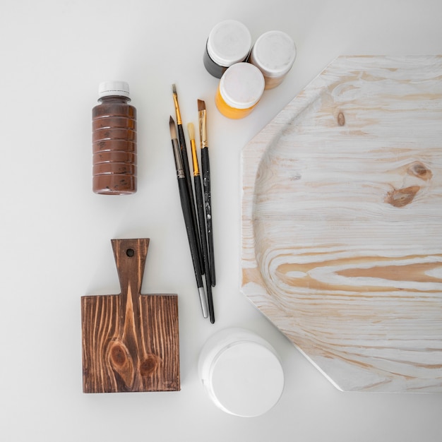 Flat lay wood crafting objects arrangement