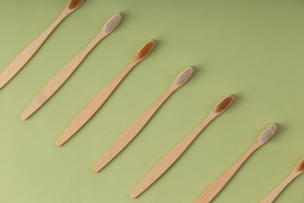 Flat lay wooden brushes arrangement