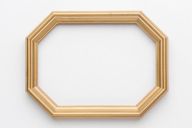 Flat lay of wooden frame with copy space