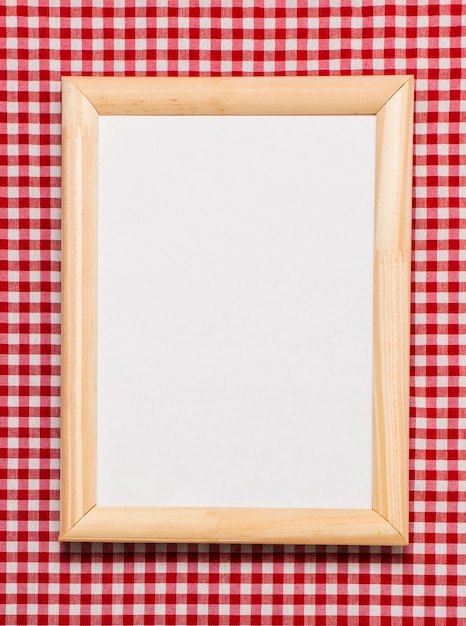Flat lay wooden frame with empty space