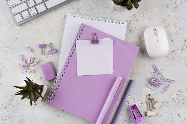 Flat lay workplace elements on marble table