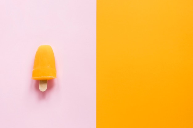 Flat lay of yummy popsicle with copy space