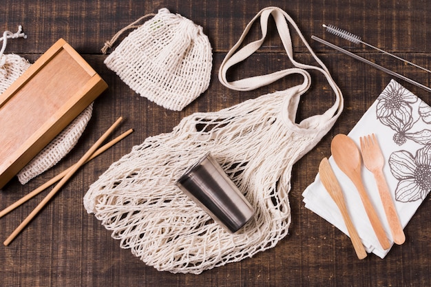 Flat lay zero waste products on wooden background