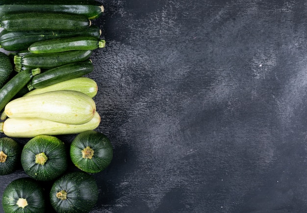 Flat lay zucchinis at left side