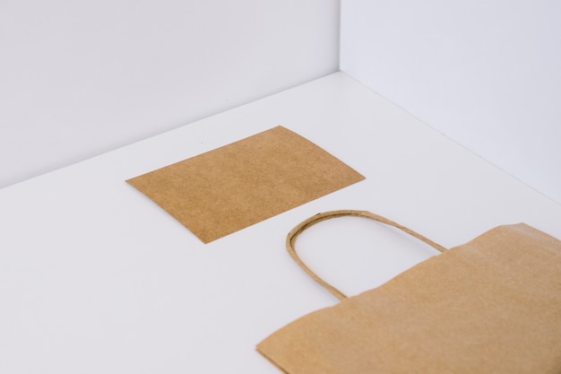 Flat paper bag and cardboard