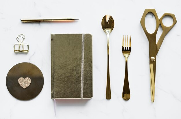 Flatlay of golden utensils decoration concept