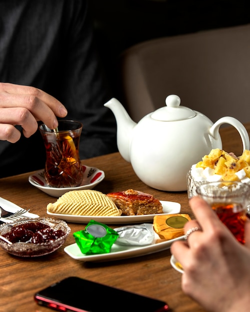 Flavored tea with jam and Ð°zeri national sweets