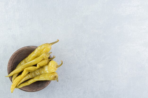 Flavorful pepper and stick on a board   