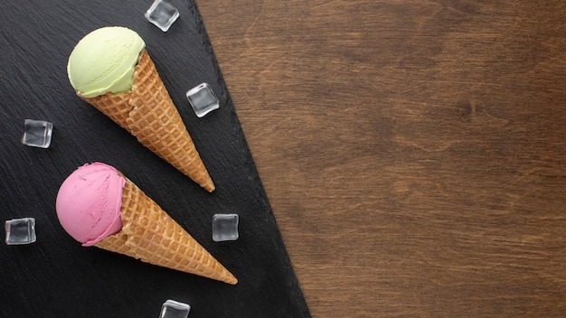 Free photo flavoured ice cream on cones with copy-space