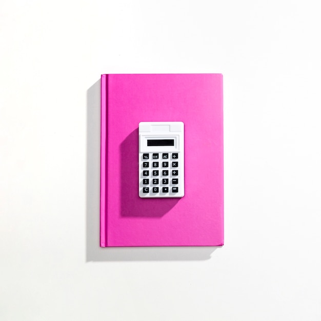 Flay lay of calculator on book