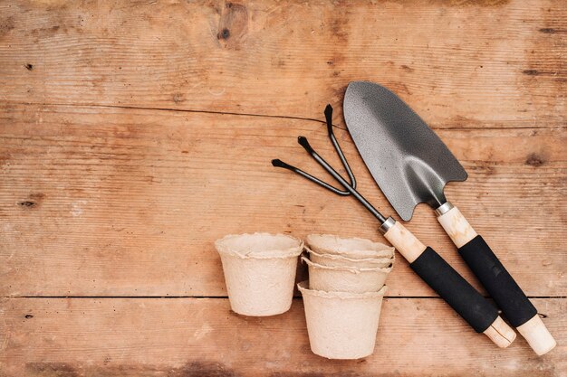 Flay lay gardening tools and flower pots