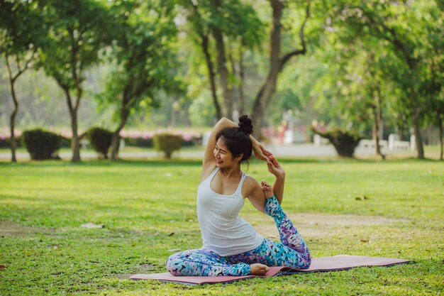 Flexible woman, yoga and nature