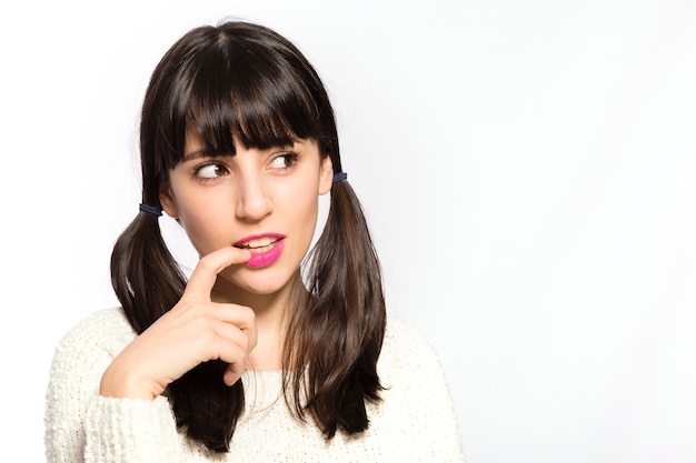 Flirty woman biting nail