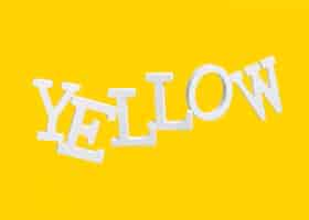 Free photo floating letters forming the word yellow