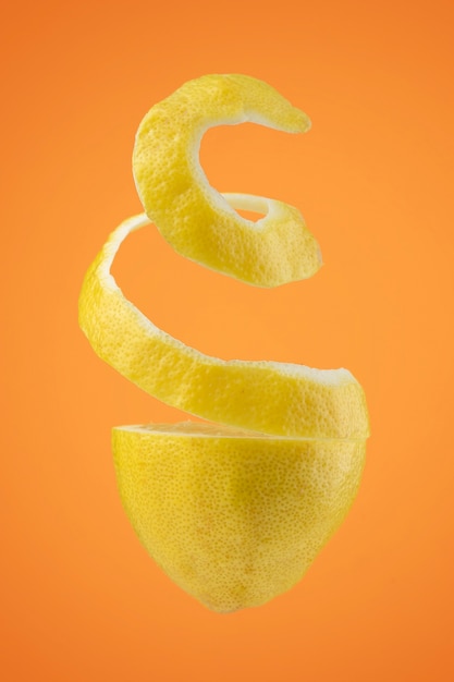 Floating sliced lemon with clear background