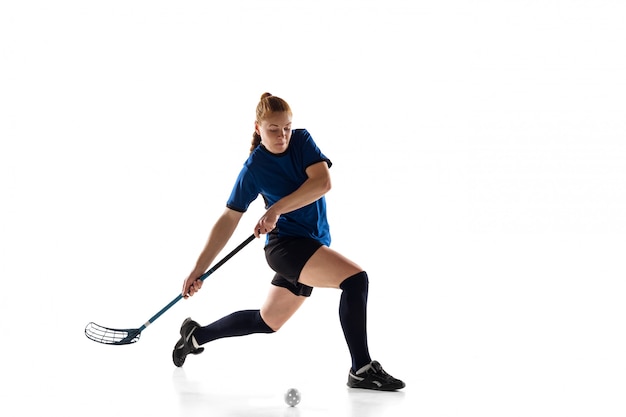 Floorball female player isolated on white, action and motion concept