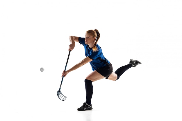 Floorball female player isolated on white, action and motion concept